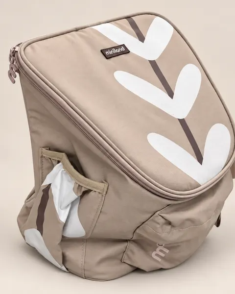 Zaino beige con foglie bianche stampate